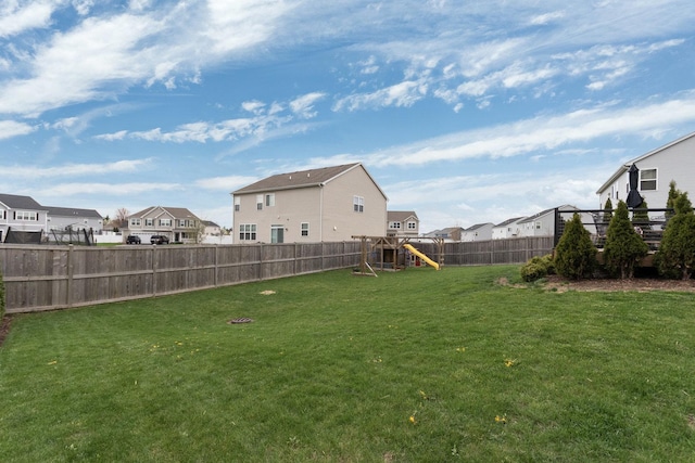 173 Willowwood Dr N, Oswego, IL 60543 - view of yard featuring a residential view and a playground