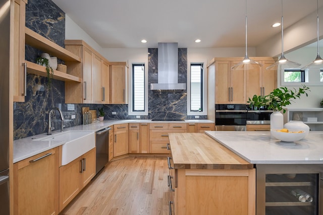 kitchen with wall chimney exhaust hood, oven, stainless steel dishwasher, open shelves, and wine cooler