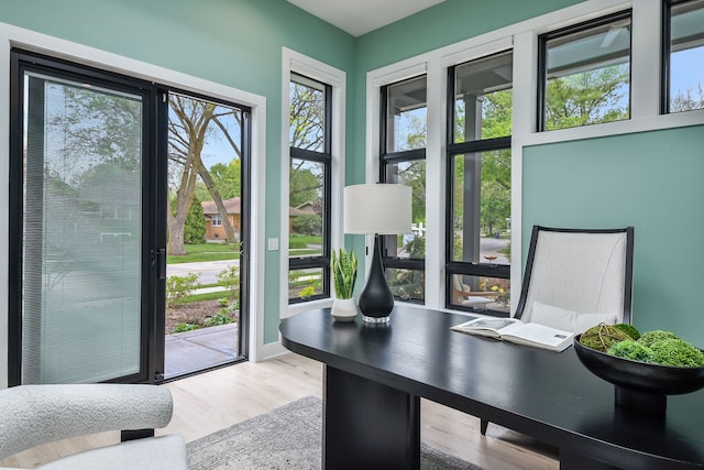 office featuring wood finished floors and baseboards