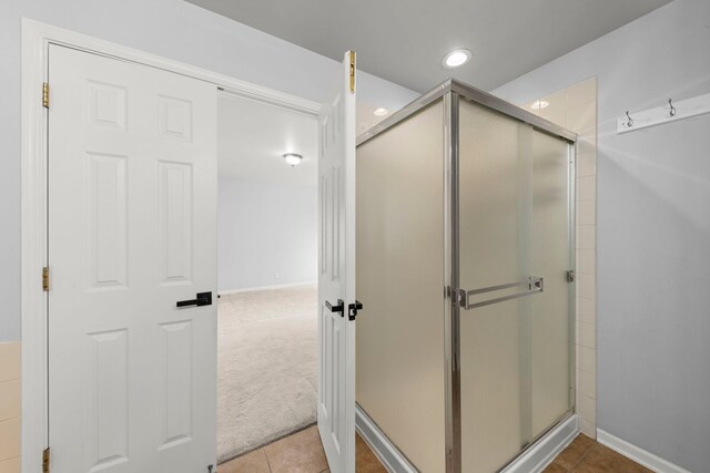 4216 Drexel Ave, Aurora, IL 60504 - full bathroom featuring a stall shower, tile patterned floors, and recessed lighting