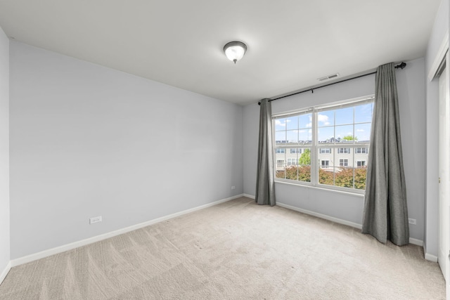 4216 Drexel Ave, Aurora, IL 60504 - empty room with light carpet and baseboards