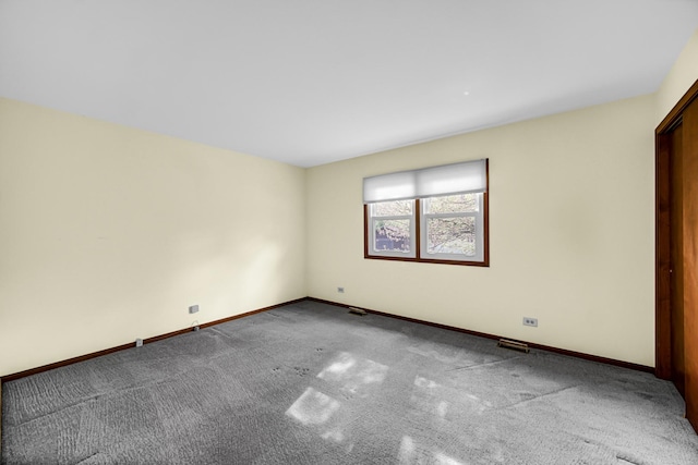 588 Renee Dr, South Elgin, IL 60177 - unfurnished bedroom with carpet floors and baseboards