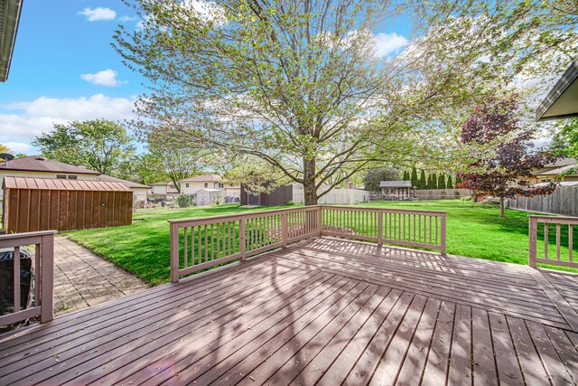 588 Renee Dr, South Elgin, IL 60177 - wooden deck featuring an outbuilding