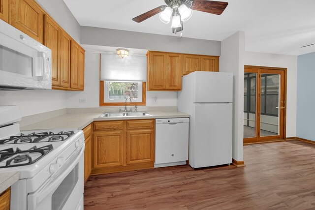 588 Renee Dr, South Elgin, IL 60177 - kitchen with white appliances, a sink, light wood-style flooring, and ceiling fan