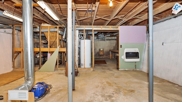 unfinished basement with heating unit and gas water heater