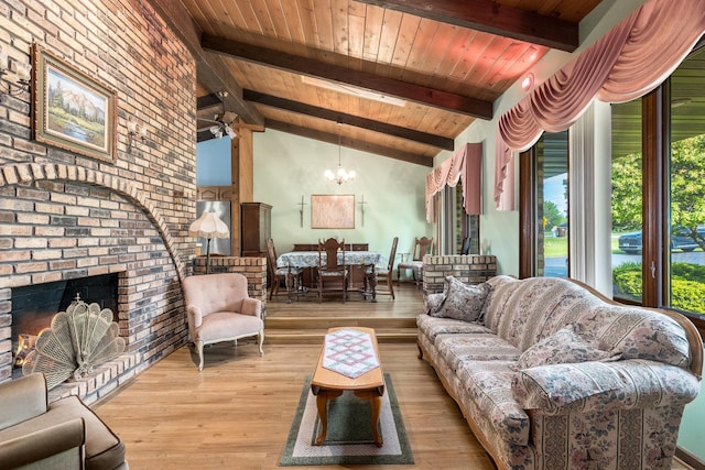 12225 W 187th St, Mokena, IL 60448 - living area featuring a chandelier, beamed ceiling, wood finished floors, a fireplace, and wooden ceiling