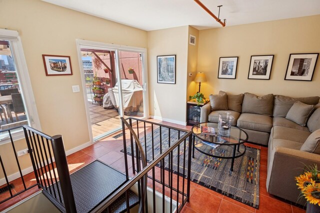 tiled living area with baseboards