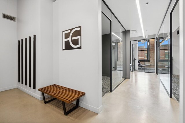 1327 W Washington Blvd Unit 5G-H, Chicago, IL 60607 - hall featuring concrete floors and baseboards