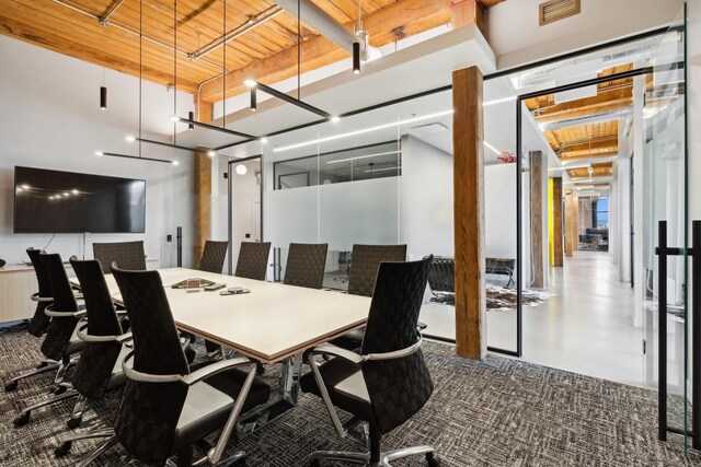 1327 W Washington Blvd Unit 5G-H, Chicago, IL 60607 - carpeted dining space with a high ceiling and wood ceiling