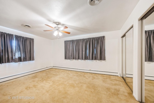 1715 W Main St, Sleepy Hollow, IL 60118 - unfurnished bedroom featuring carpet flooring, ceiling fan, and a baseboard radiator