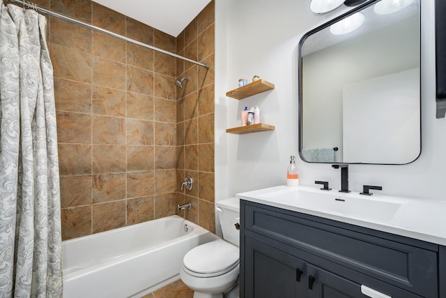 full bathroom featuring shower / bath combo, toilet, and vanity