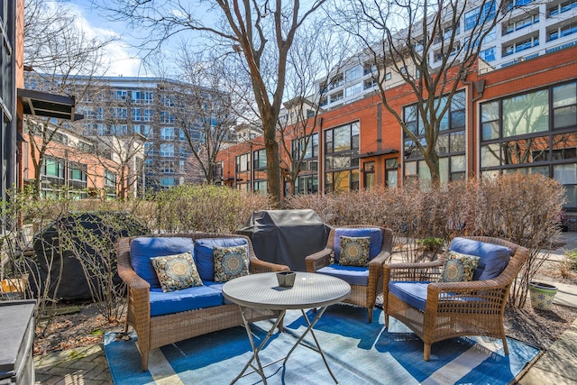 view of patio featuring grilling area and an outdoor hangout area