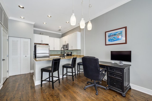 office featuring ornamental molding, recessed lighting, dark wood finished floors, and baseboards