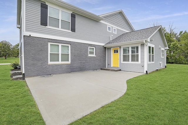 8081 Tennessee Ave, Willowbrook, IL 60527 - view of front of house featuring a front lawn and a patio area