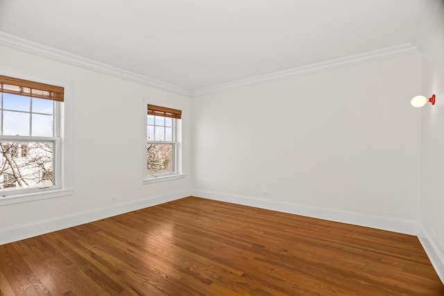240 Lee St Unit 3, Evanston, IL 60202 - spare room featuring baseboards, wood finished floors, and crown molding