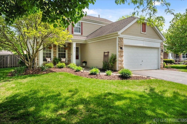 311 Mayfair Ln, South Elgin, IL 60177 - traditional-style home with stone siding, an attached garage, driveway, and roof with shingles