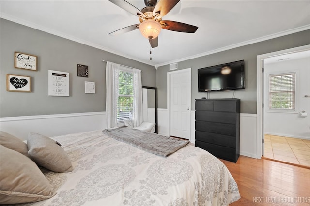 311 Mayfair Ln, South Elgin, IL 60177 - bedroom featuring crown molding, wood finished floors, and ceiling fan