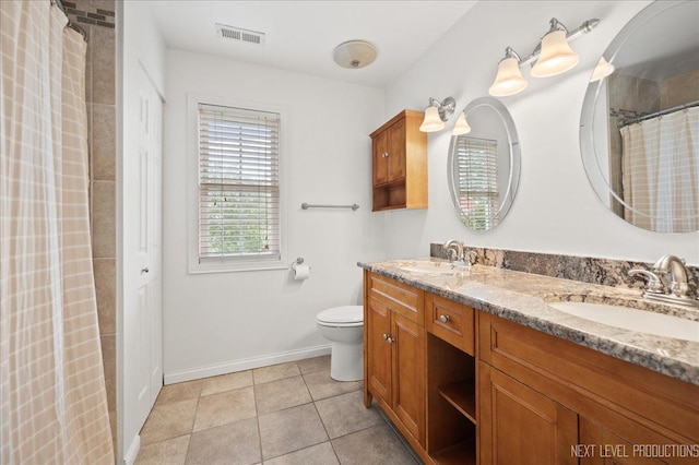 311 Mayfair Ln, South Elgin, IL 60177 - bathroom with toilet, baseboards, tile patterned floors, double vanity, and a shower with curtain