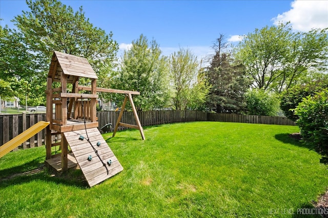 311 Mayfair Ln, South Elgin, IL 60177 - view of yard with a playground and view of scattered trees
