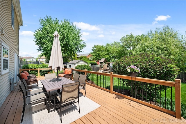 311 Mayfair Ln, South Elgin, IL 60177 - wooden terrace featuring outdoor dining space and a playground