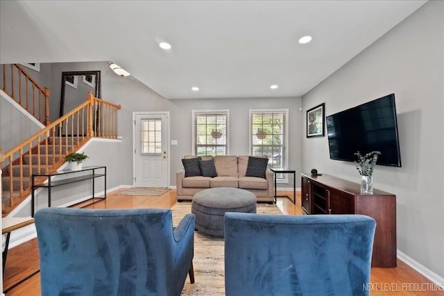 311 Mayfair Ln, South Elgin, IL 60177 - living room featuring baseboards, stairs, light wood-style flooring, and recessed lighting