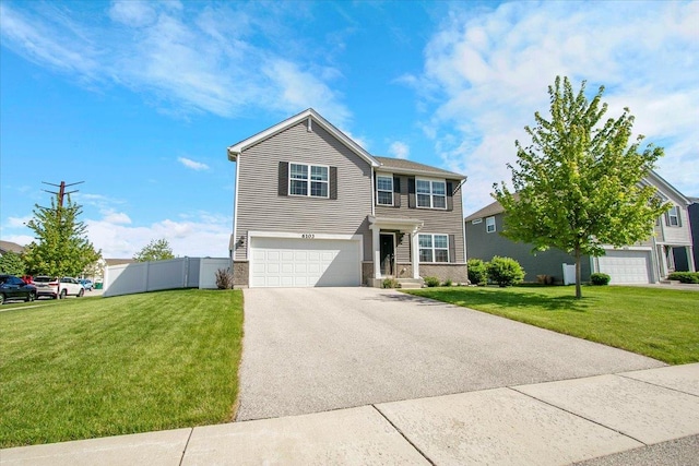 6103 Winterhaven Dr, Joliet, IL 60431 - traditional-style house featuring driveway, a garage, and stone siding