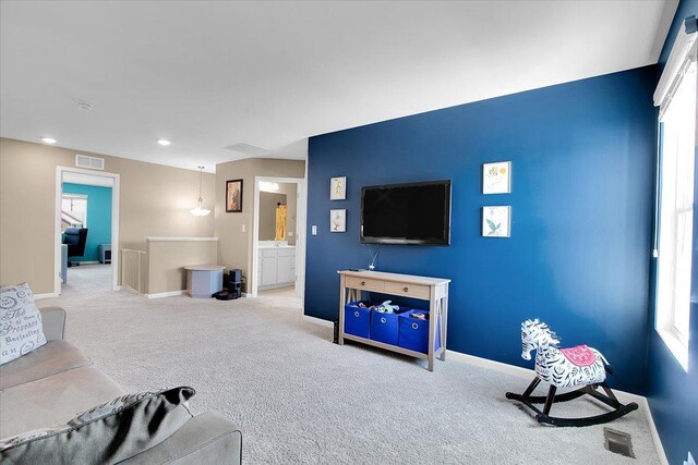 6103 Winterhaven Dr, Joliet, IL 60431 - living room with carpet, baseboards, and recessed lighting