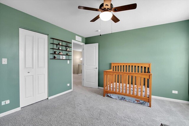 6103 Winterhaven Dr, Joliet, IL 60431 - carpeted bedroom with baseboards, a closet, and a ceiling fan