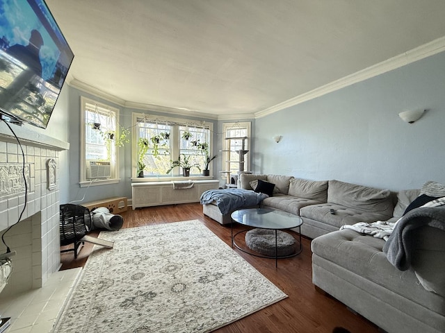 living room featuring crown molding, wood finished floors, and cooling unit