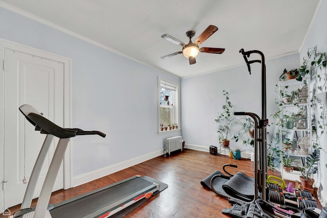 2703 W Estes Ave Unit 3, Chicago, IL 60645 - exercise area featuring radiator heating unit, a ceiling fan, ornamental molding, wood finished floors, and baseboards