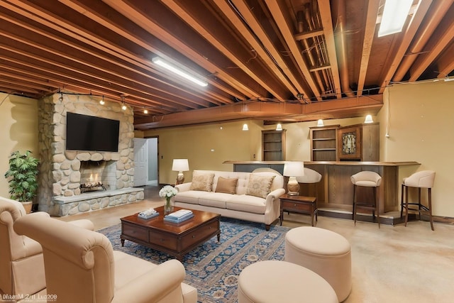 1302 Bradley Ct, Spring Grove, IL 60081 - living area featuring concrete floors, a fireplace, and baseboards