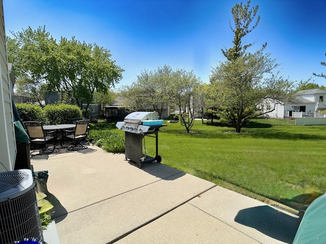 view of patio / terrace featuring grilling area, central air condition unit, and outdoor dining area