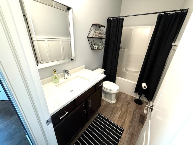 12074 Winterberry Ln, Plainfield, IL 60585 - bathroom with wood finished floors, toilet, vanity, and shower / tub combo