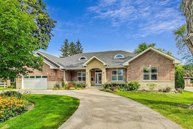 view of front of house featuring brick siding, a front lawn, concrete driveway, a garage, and stone siding
