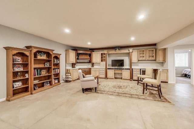living room with recessed lighting, baseboards, and a desk