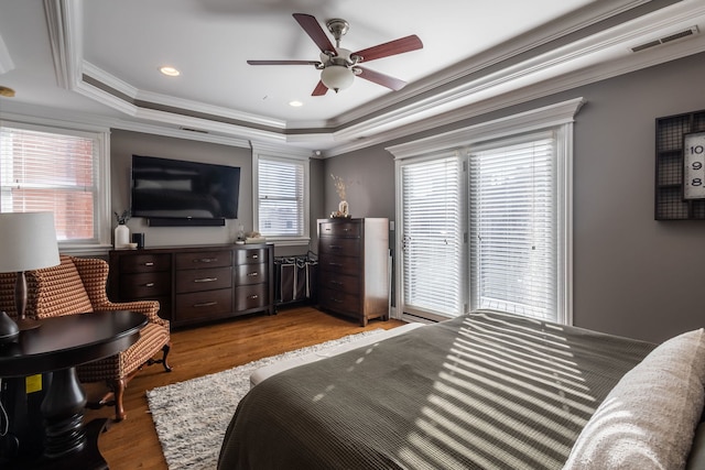853 W Buckingham Pl Unit 4, Chicago, IL 60657 - bedroom with a tray ceiling, light wood-style flooring, ornamental molding, and ceiling fan
