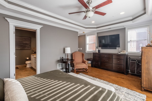 853 W Buckingham Pl Unit 4, Chicago, IL 60657 - bedroom featuring crown molding, wood finished floors, a raised ceiling, ensuite bath, and a ceiling fan