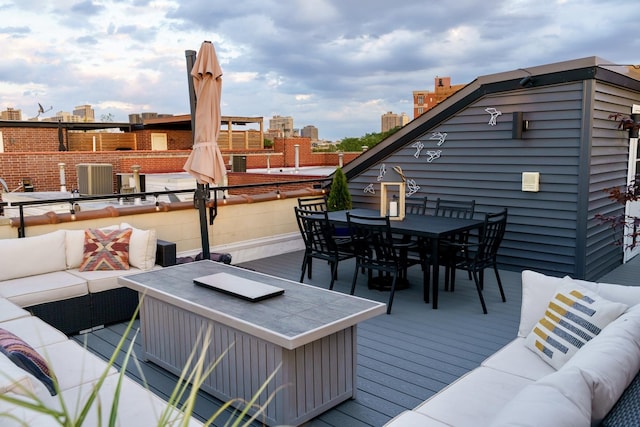 853 W Buckingham Pl Unit 4, Chicago, IL 60657 - deck featuring outdoor lounge area, central AC, and outdoor dining space