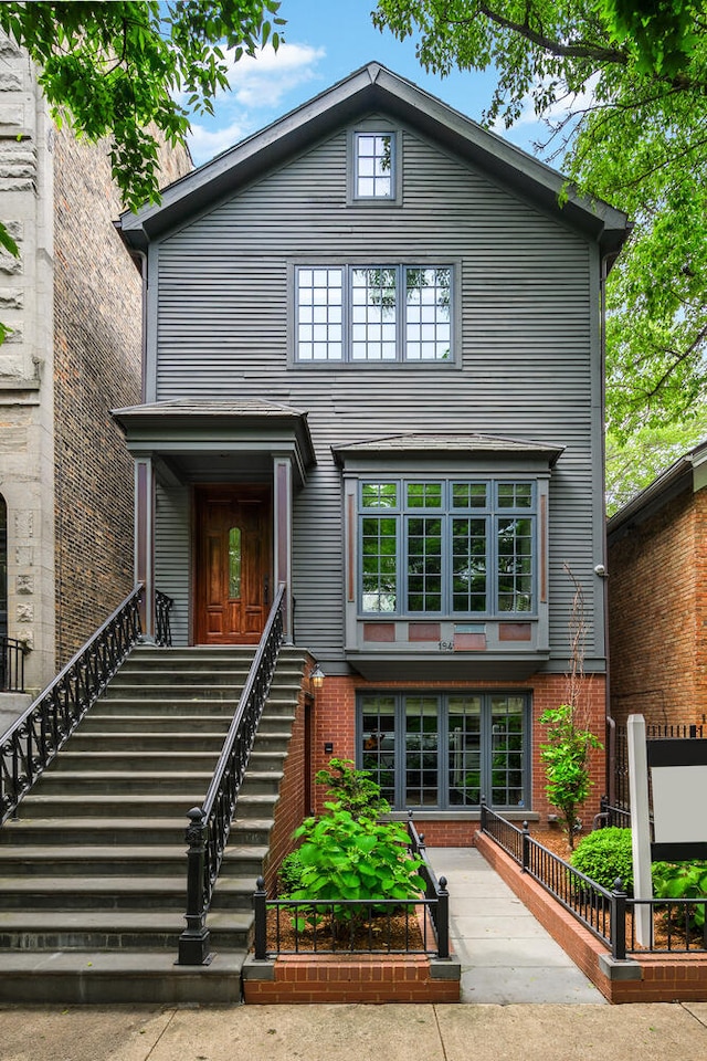 1942 N Cleveland Ave, Chicago, IL 60614 - view of front facade featuring brick siding