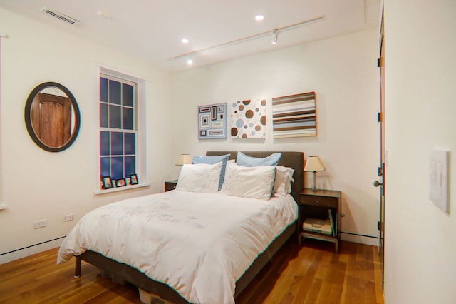 1942 N Cleveland Ave, Chicago, IL 60614 - bedroom with wood finished floors and rail lighting