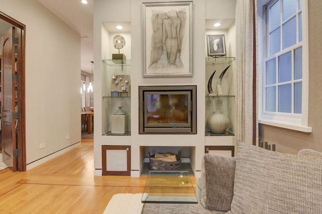 1942 N Cleveland Ave, Chicago, IL 60614 - living area featuring wood finished floors, baseboards, built in features, and recessed lighting