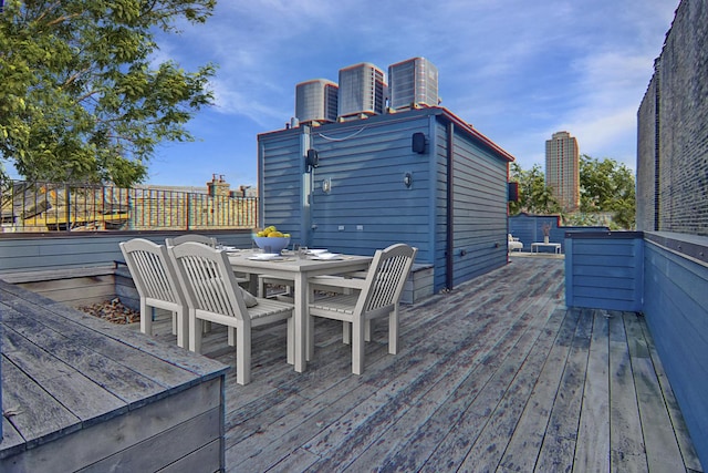 1942 N Cleveland Ave, Chicago, IL 60614 - wooden terrace with central AC, outdoor dining area, and fence