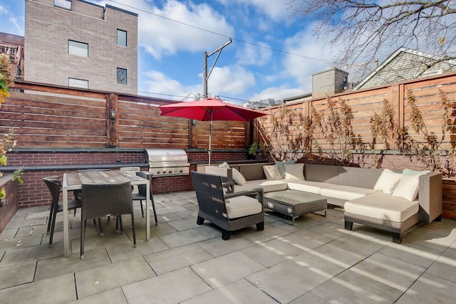 1942 N Cleveland Ave, Chicago, IL 60614 - view of patio / terrace with a fenced backyard, an outdoor hangout area, grilling area, and outdoor dining area