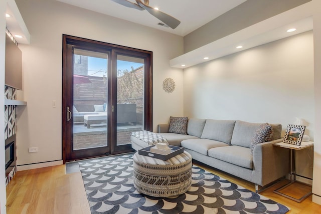 1942 N Cleveland Ave, Chicago, IL 60614 - living area with light wood-style floors, recessed lighting, and baseboard heating