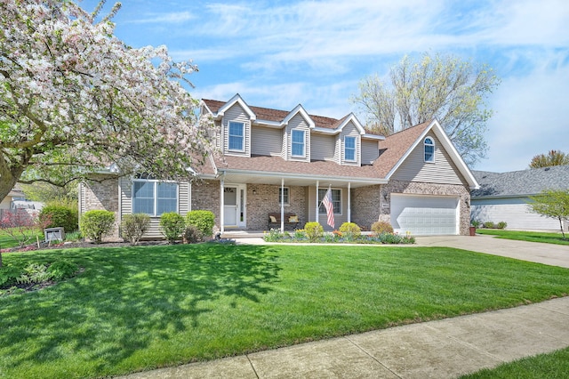 1002 Birchwood Ct, Morris, IL 60450 - traditional-style house with brick siding, concrete driveway, a garage, a front yard, and a porch