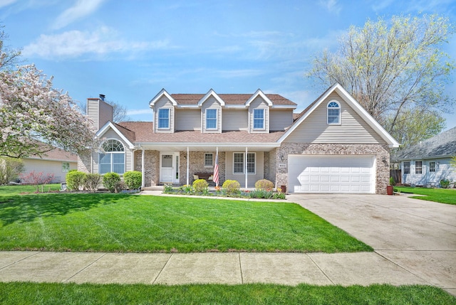 1002 Birchwood Ct, Morris, IL 60450 - traditional home with driveway, covered porch, a front lawn, a shingled roof, and brick siding