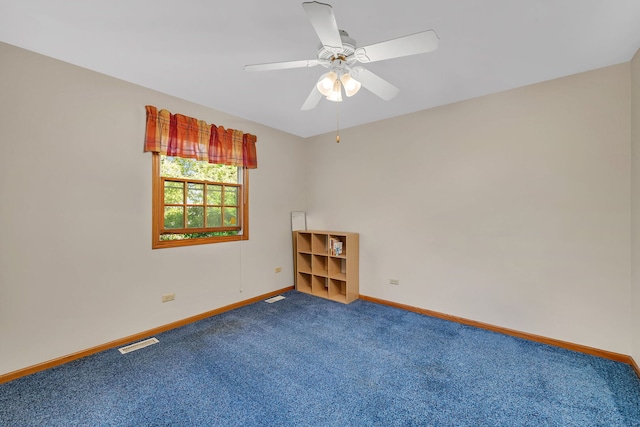 1002 Birchwood Ct, Morris, IL 60450 - carpeted spare room featuring baseboards and a ceiling fan