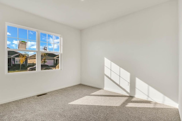 2611 Harnish Dr, Algonquin, IL 60102 - carpeted empty room featuring baseboards