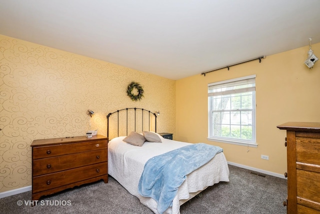 220 Wethington Dr Unit B, Wauconda, IL 60084 - carpeted bedroom featuring wallpapered walls and baseboards