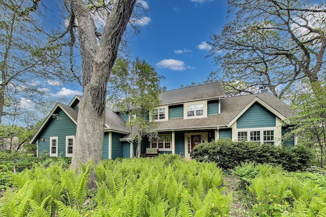 view of front of house featuring a shingled roof